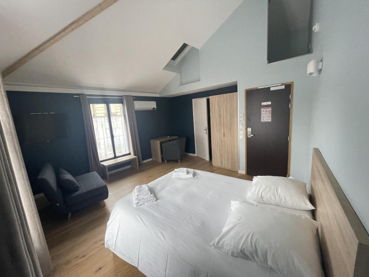 Le Celtic Hotel Le Thillay Quarto foto