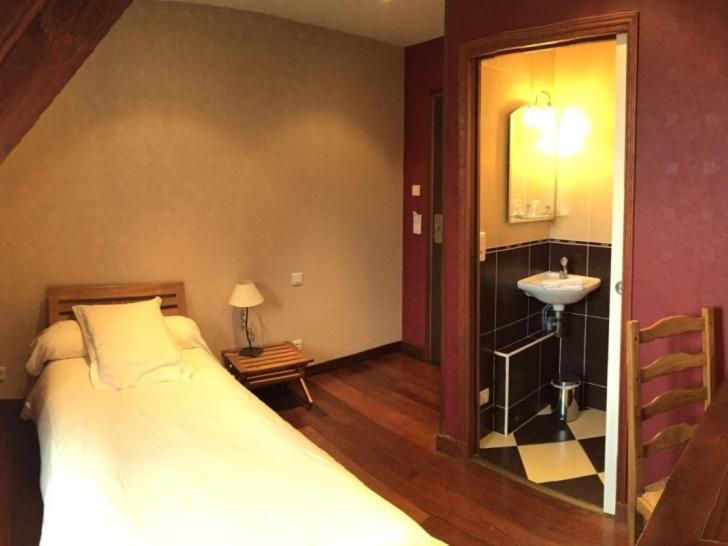 Le Celtic Hotel Le Thillay Quarto foto