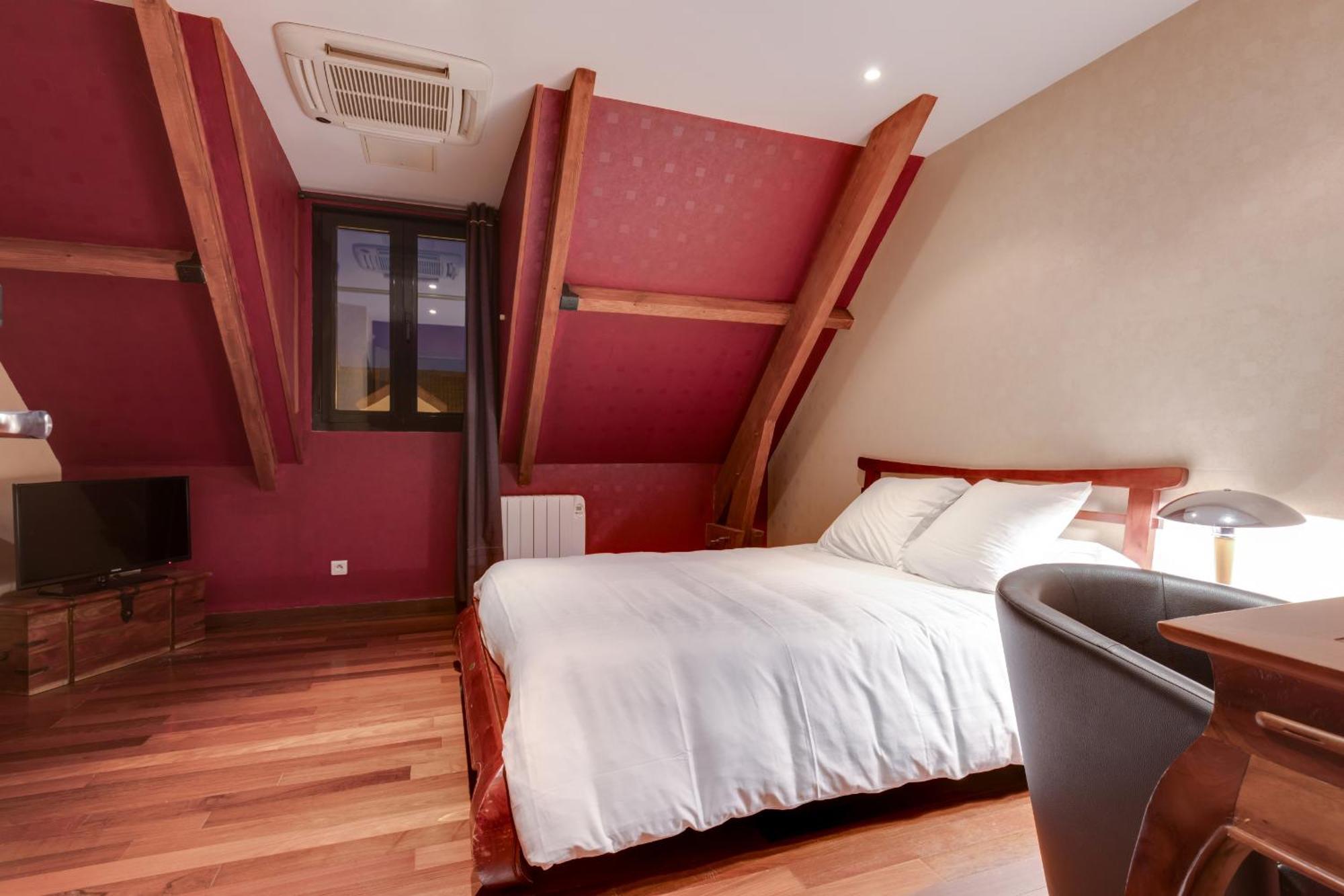 Le Celtic Hotel Le Thillay Quarto foto